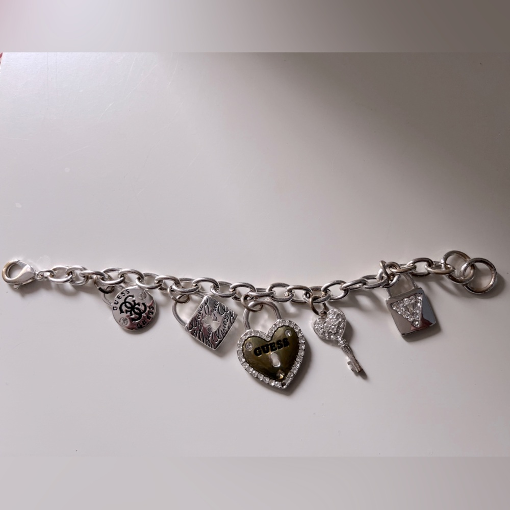 GUESS Silver Tone Charm Bracelet with Heart and Key Charms